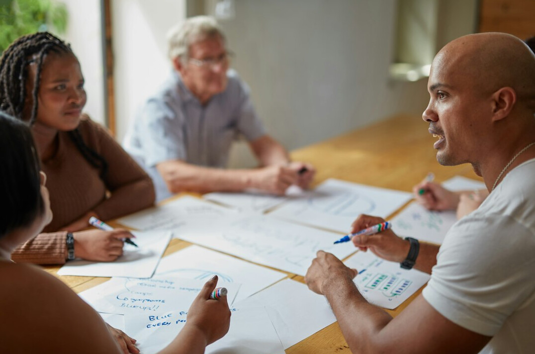 diverse group discussing future